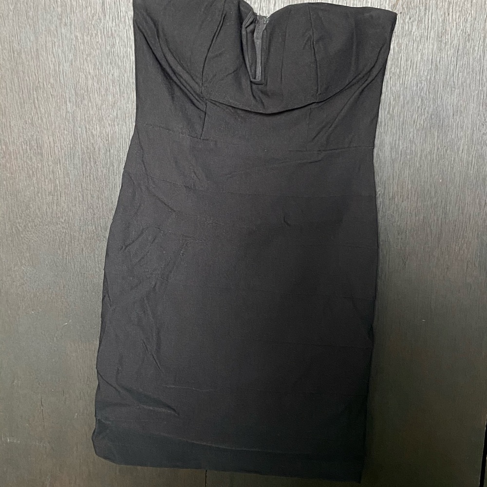 Skin tight strapless black dress